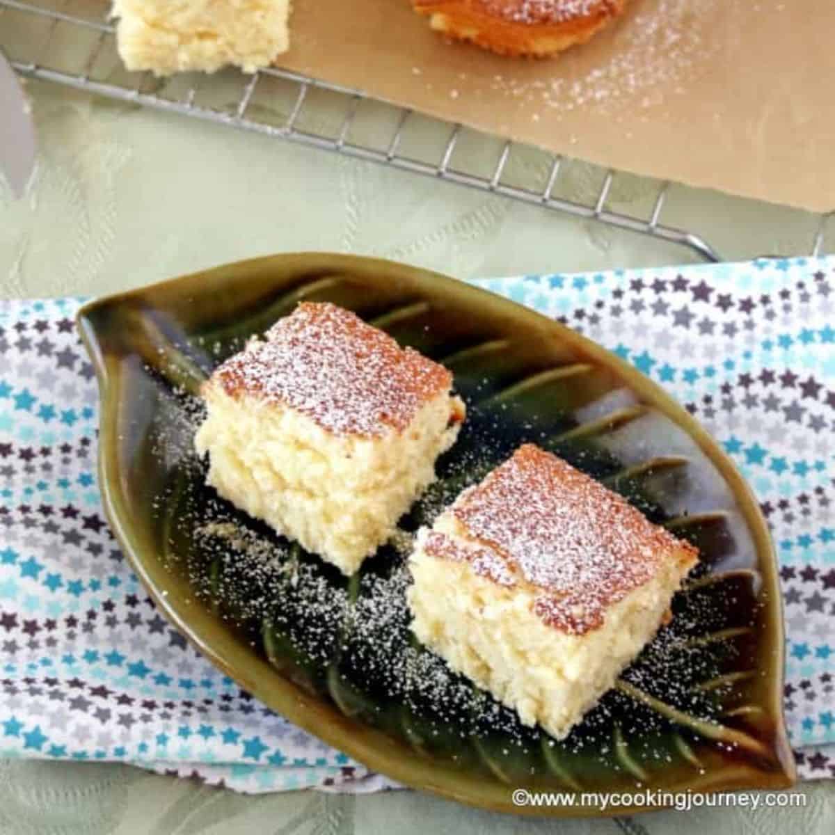 Hot Milk Cake in a green decorative plate - Featured Image