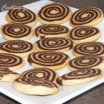 Chocolate Pinwheel Cookies in a White Plate - Featured Image