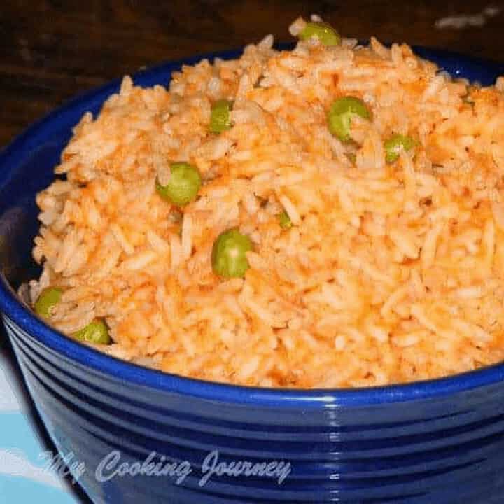 Mexican Rice in a blue bowl - Featured Image