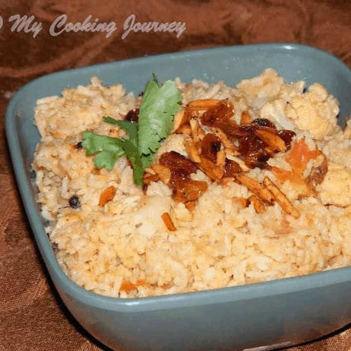 Cauliflower Dum Biriyan in a bowl - Feature Image