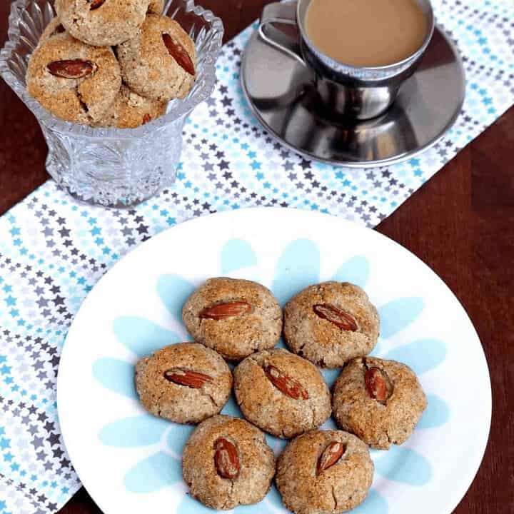 Chinese Almond Cookies in a white plate and glass container - Feature Image