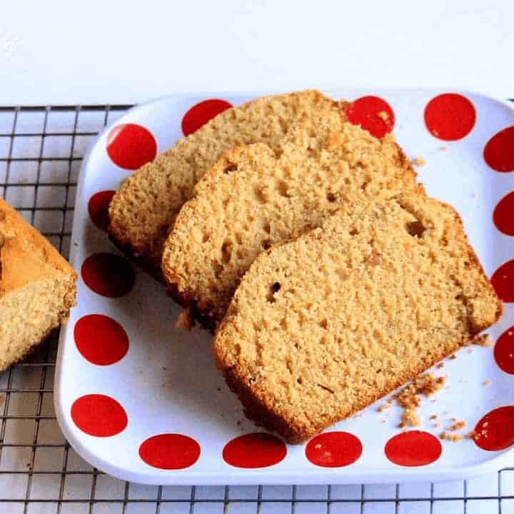 Honey Nut Bread With Orange Zest in a white plate - Feature Image