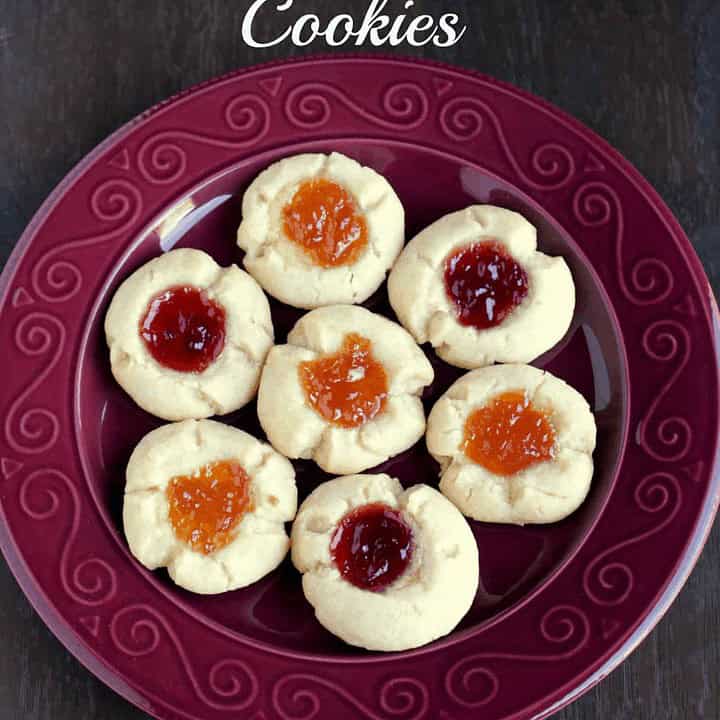 Jam Thumbprint Cookies in a Red Plate - Feature Image