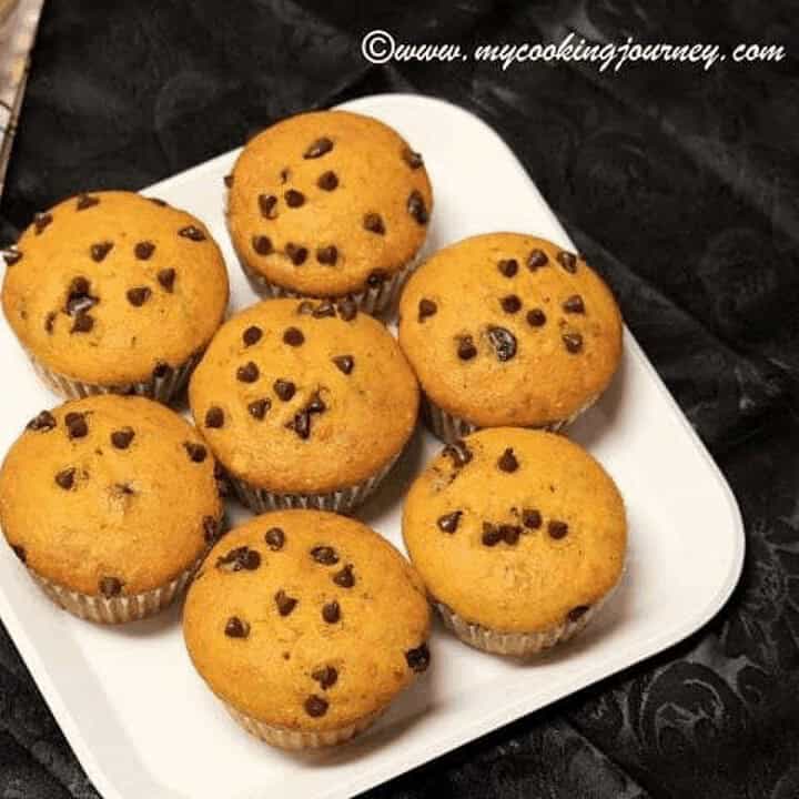 Mango and Chocolate Chip Muffins in a white plate - Feature Image